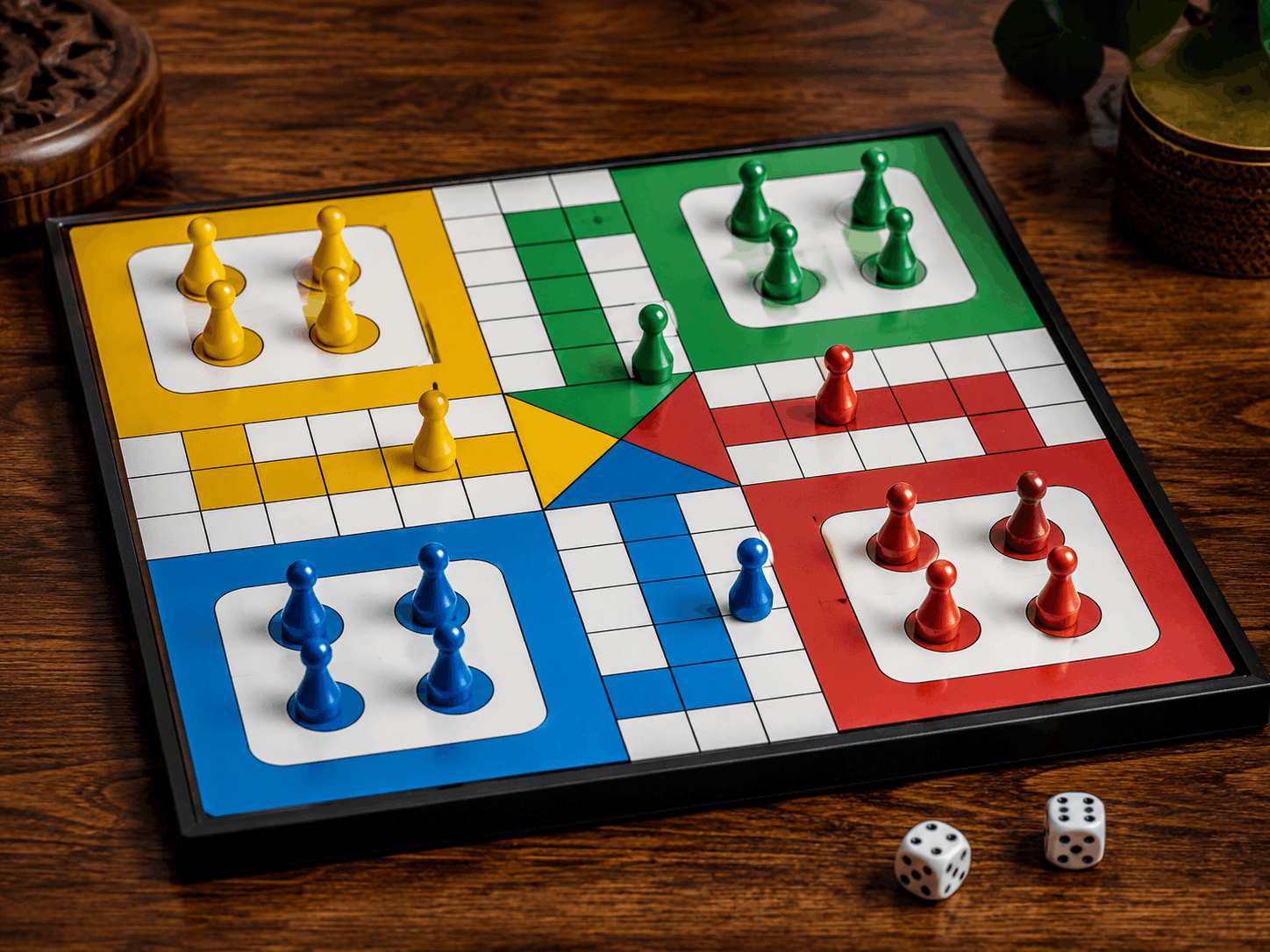Colourful Ludo board with tokens and dice